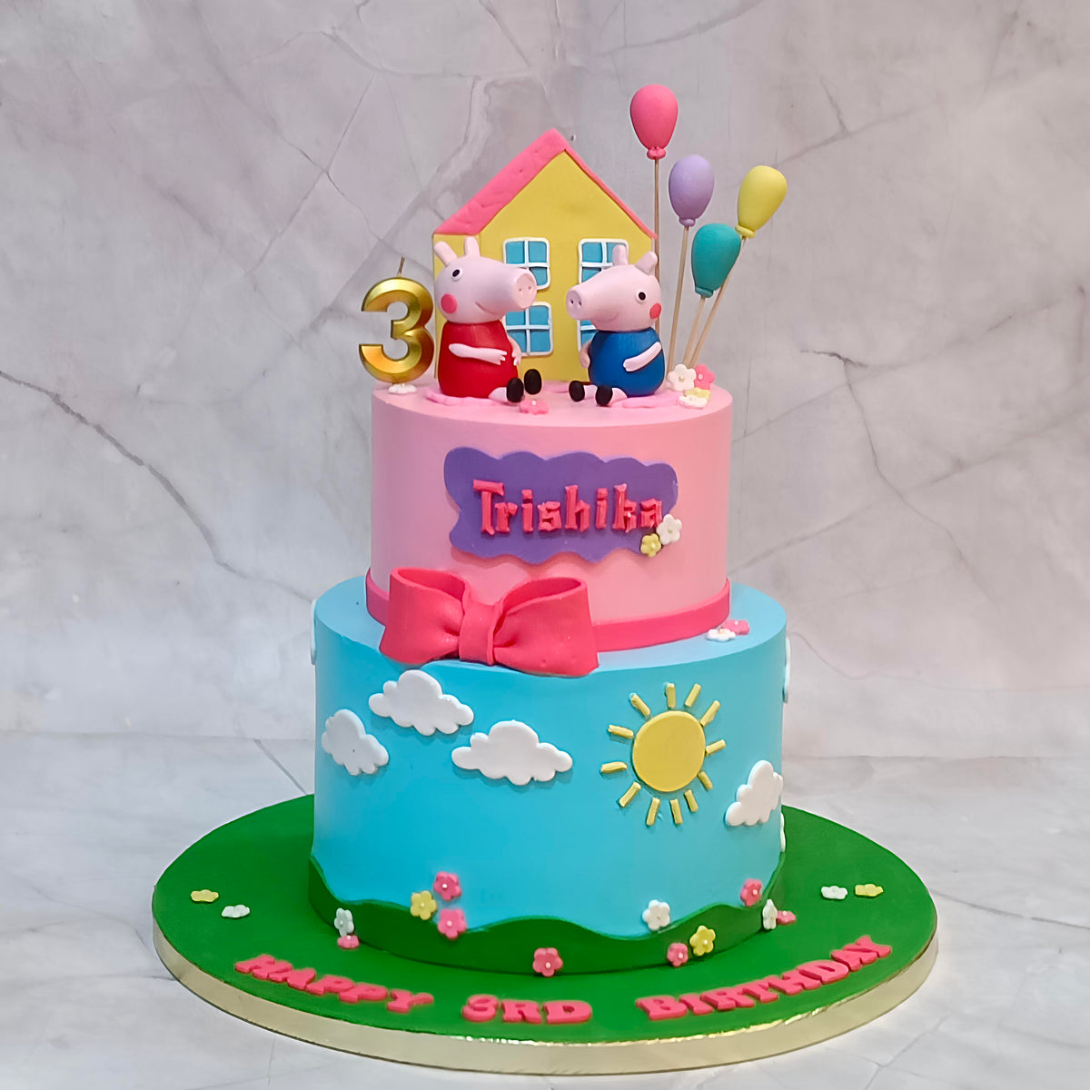 Peppa Pig kids birthday cake featuring a house, a theme cake Noida design and eggless cakes for a girl's 3rd birthday.
