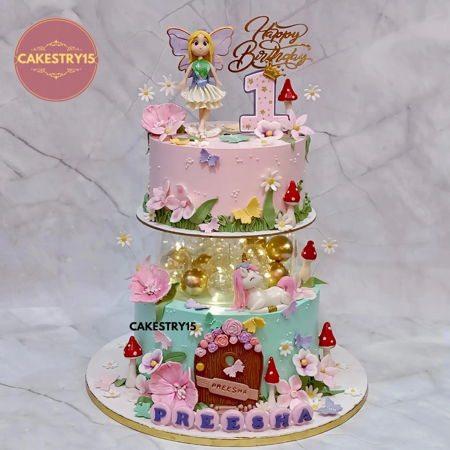 5kg chocolate fairy unicorn theme first birthday cake from Cakestry15 with flowers, butterflies, mushrooms, fondant door and unicorn
