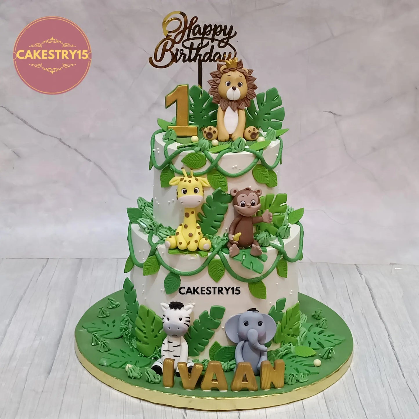 Premium eggless jungle theme kids birthday cake with jungle animals and 2 tier design by Cakestry15, theme cake Noida for first birthday celebrations