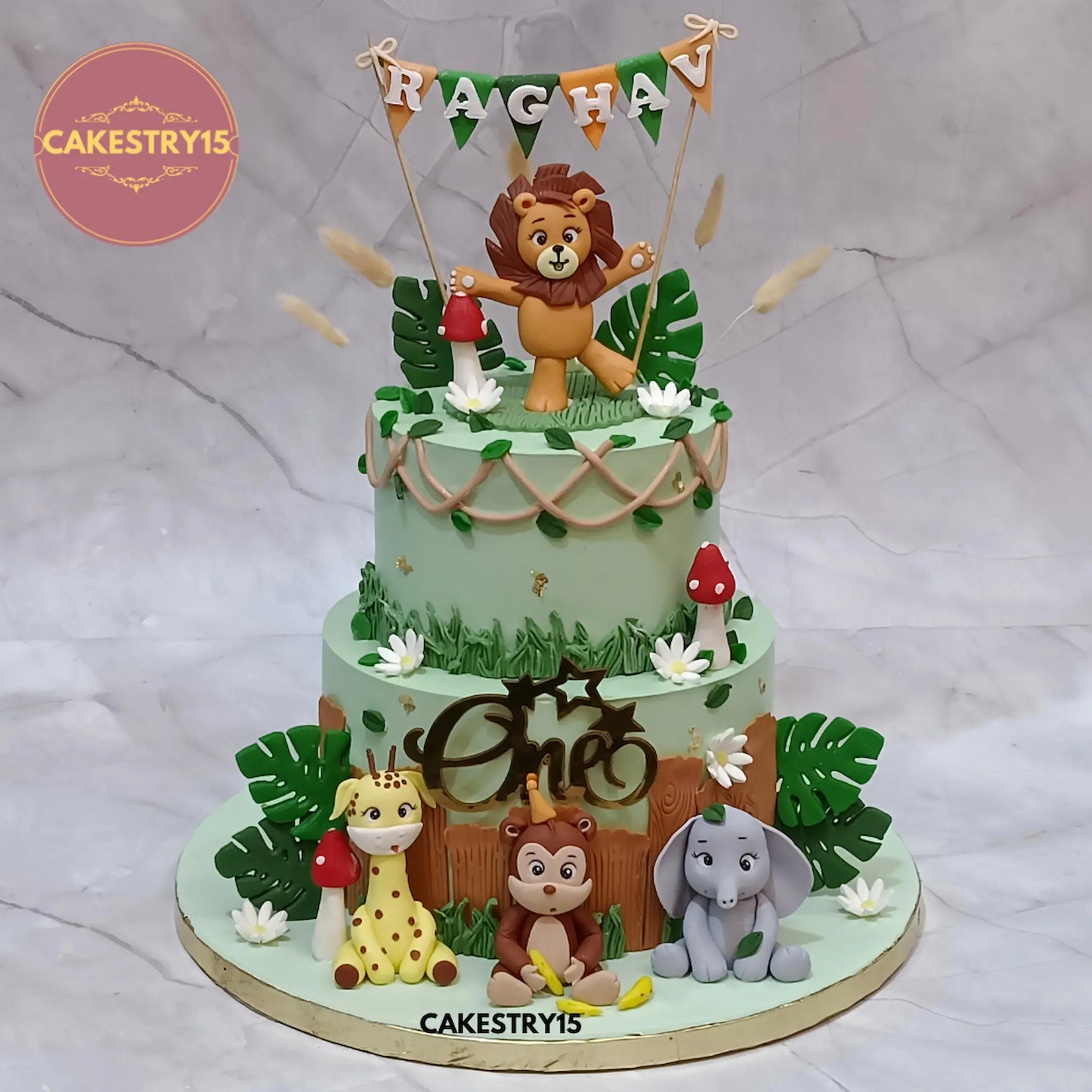 3kg chocolate jungle theme first birthday cake with lion topper, giraffe, monkey, elephant by Cakestry15 Noida
