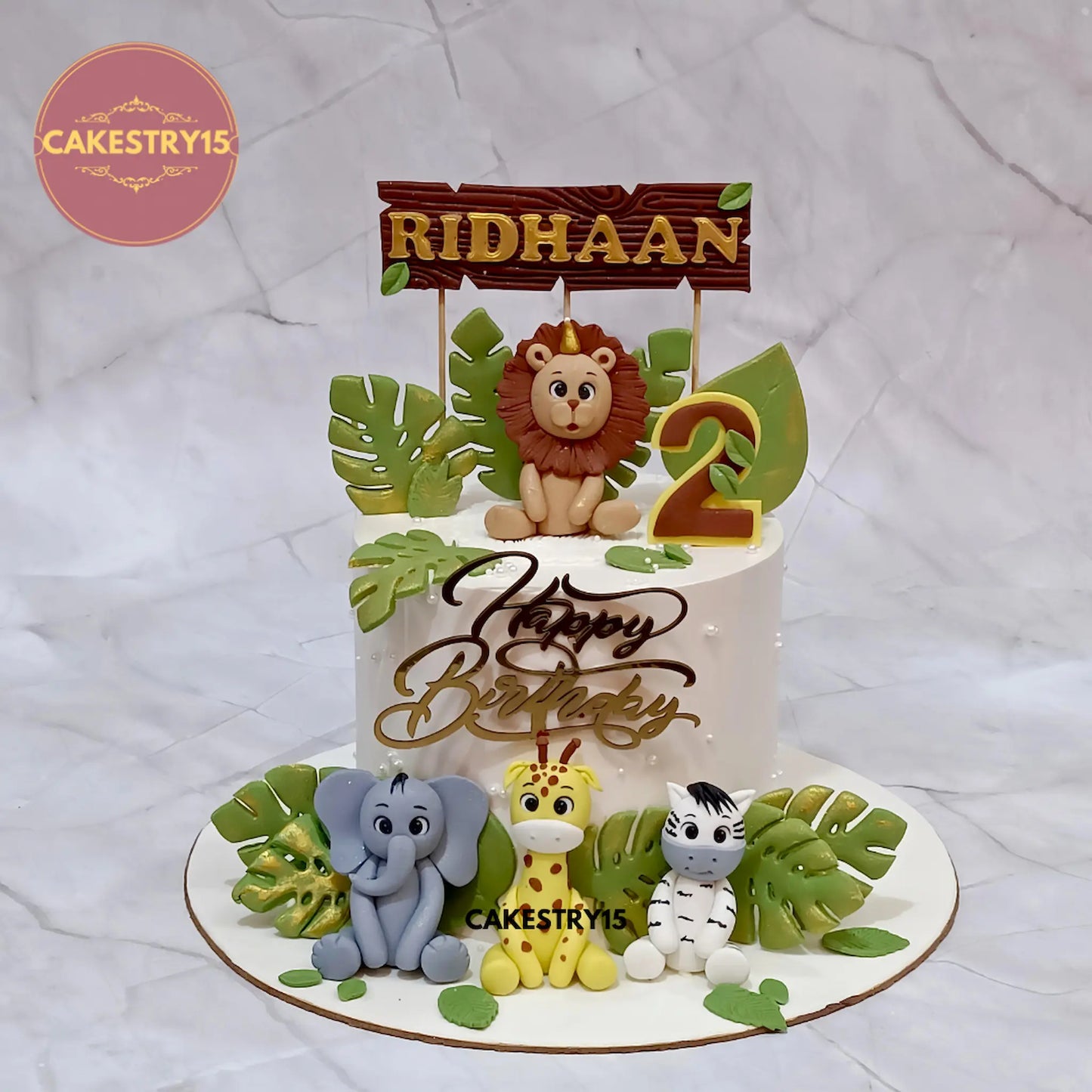 1.5kg blueberry jungle theme cake with fondant lion elephant giraffe and zebra from Cakestry15 Noida