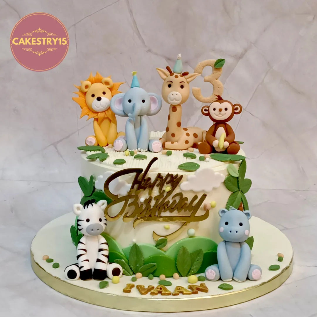 Roaring jungle kids birthday cake in Noida with safari animal figurines, premium jungle detailing, and eggless chocolate flavour.