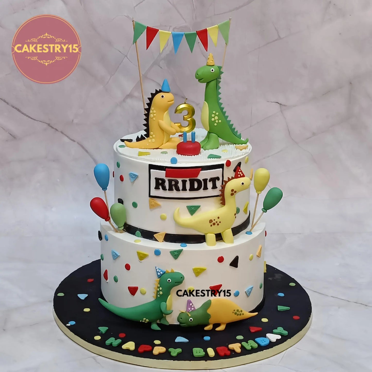 5kg choco chips dino theme birthday cake with fondant dinosaurs, balloons, and candle by Cakestry15 Noida