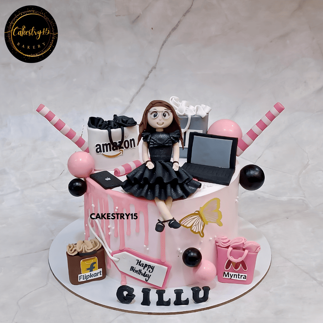 Shopaholic birthday theme cake for Gillu with girl figurine, shopping bags, and chocolate flavor by cakestry15,best bakery noida