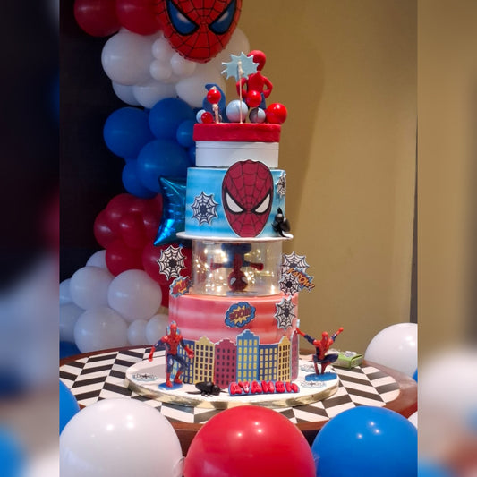 Spiderman theme birthday cake displayed at the venue for a 6th birthday celebration.