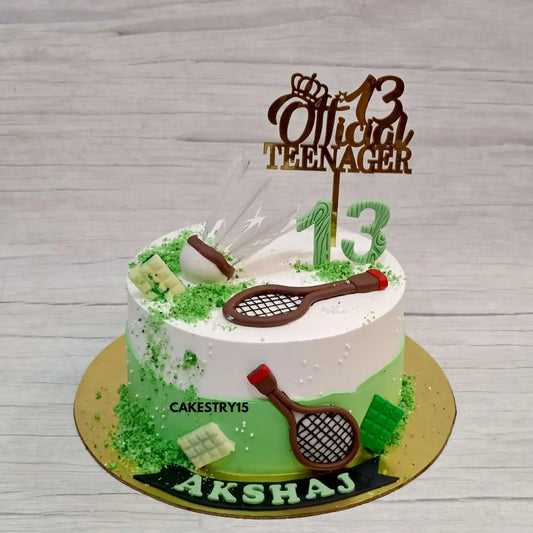 Tennis-themed 2kg chocolate truffle cake with a fondant shuttlecock, tennis racquets, and an "Official 13 Teenager" tag by cakestry15 noida, best bakery noida