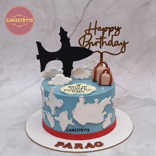 1kg traveller theme pineapple cake with world map and airplane design from Cakestry15 in noida