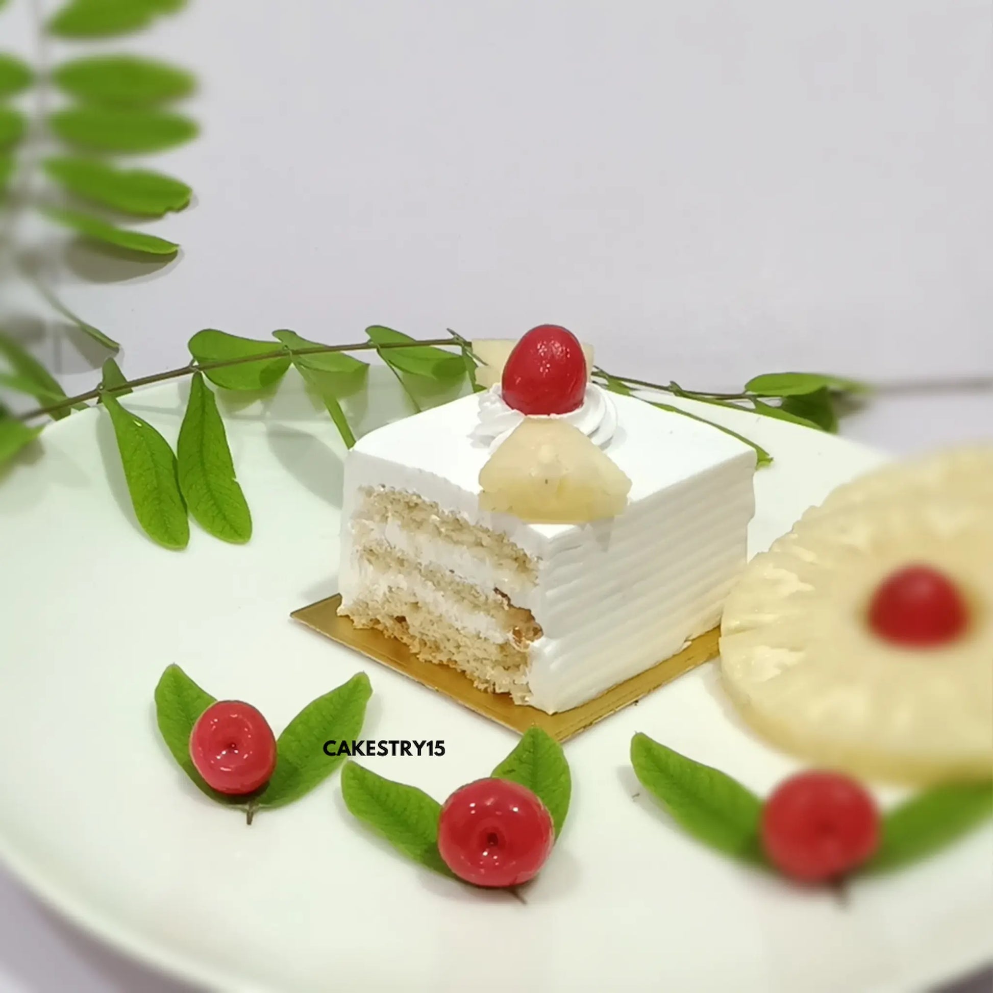 Pineapple pastry cake layered with whipped cream and pineapple chunks by Cakestry15