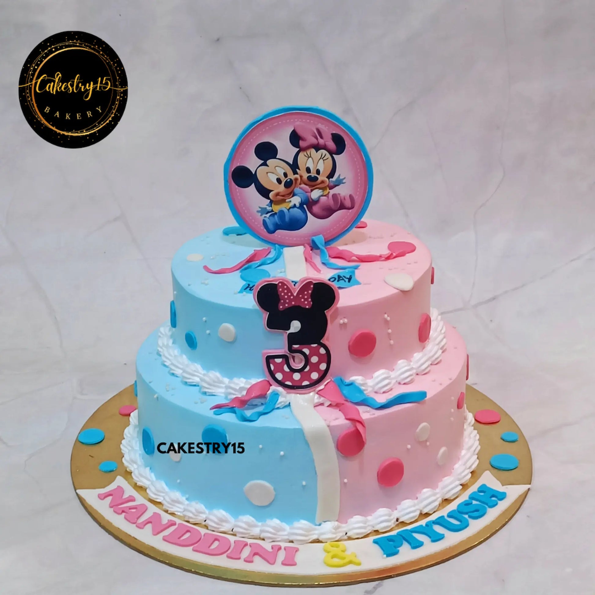 2kg pineapple birthday cake for twins with Mickey & Minnie theme in pink and blue by Cakestry15 Noida