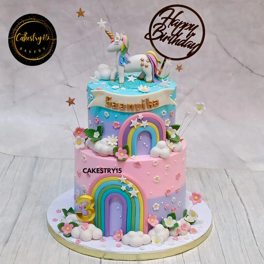 3kg two-tier unicorn birthday cake in choco vanilla for Saanvika’s 3rd birthday with rainbow, stars, and clouds
