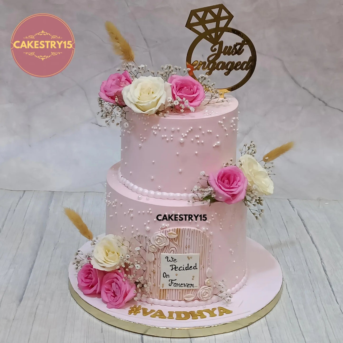 3kg just engaged floral cake by cakestry15 in noida for vaidhya