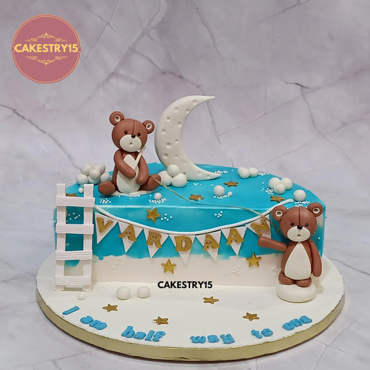 2kg eggless butterscotch teddy cake with ladder, crescent and clouds from Cakestry15 Noida