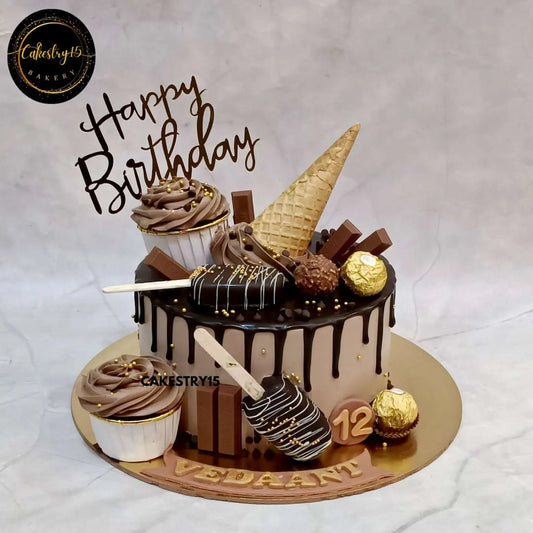 1kg chocolate birthday cake for Vedant's 12th with cakesicles, Ferrero Rocher, cupcakes, KitKat, and waffle cone toppings by cakestry15,best bakery noida