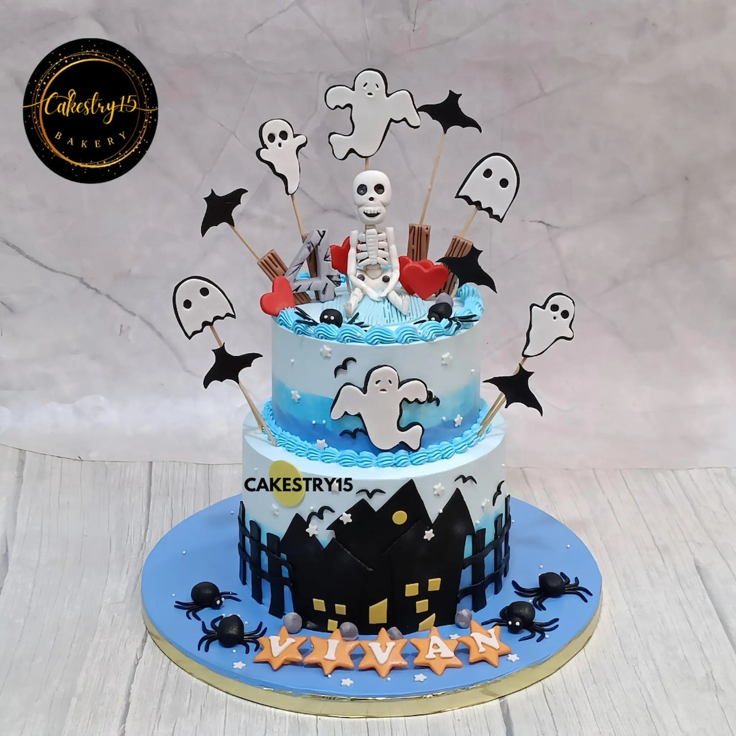 Halloween theme 3kg chocolate birthday cake for 4-year-old Vivan with skeleton, ghost house, and bats