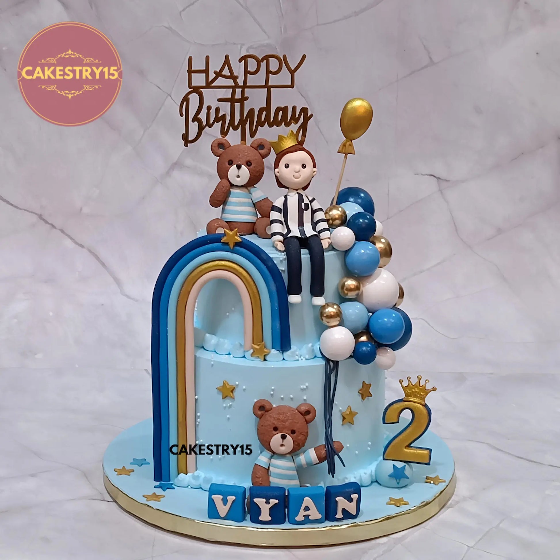 2kg choco butterscotch teddy theme 2 tier birthday cake for Vyan with fondant rainbow and balloon design from Cakestry15
