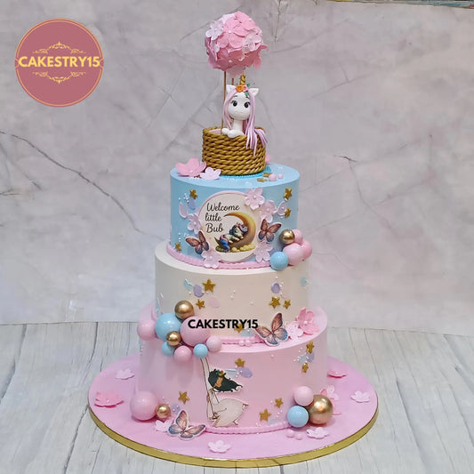 5kg chocolate 3-tier unicorn baby welcome cake by Cakestry15 with balloon and swing design by cakestry15