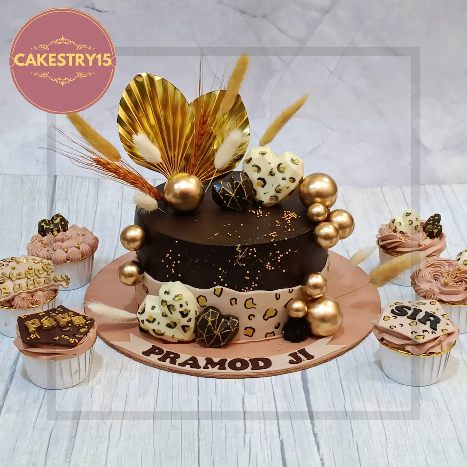 Shopaholic themed birthday cake for husband with fashion and gadgets