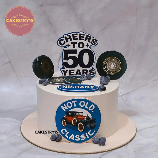 1kg eggless butterscotch classic car theme cake for 50th birthday by Cakestry15 Noida