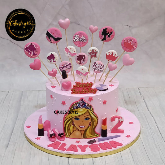 Barbie-themed 1.5kg choco vanilla cake for 2nd birthday with edible Barbie image and fondant accessories
