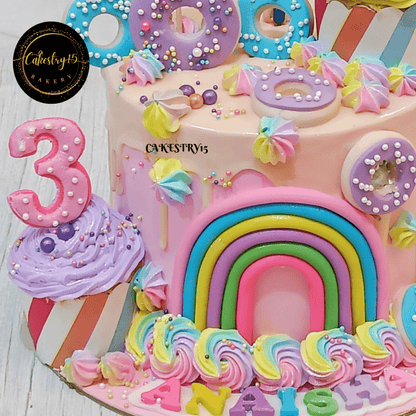 Candyland theme 1kg Vanilla flavour 3rd birthday cake,bottom tier close up image