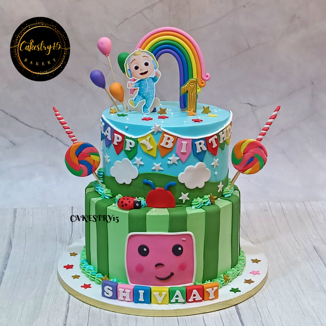 Cocomelon theme 5kg size 2 tier pineapple flavor 1st birthday Cake by cakestry15 noida,full image