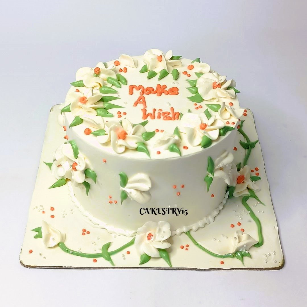 Floral Ivory 1kg choco chip birthday cake by cakestry15,noida,full cake image 