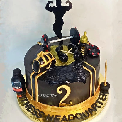 Gym Fitness Theme 2kg chocolate anniversary cake by cakestry15,noida,cake top angle image