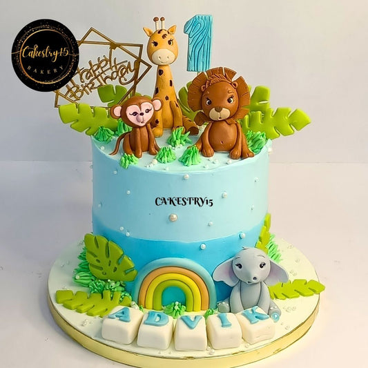 Jungle Theme Rainbow 1.5kg Pineapple 1st birthday Cake by cakestry15,noida,cake full image