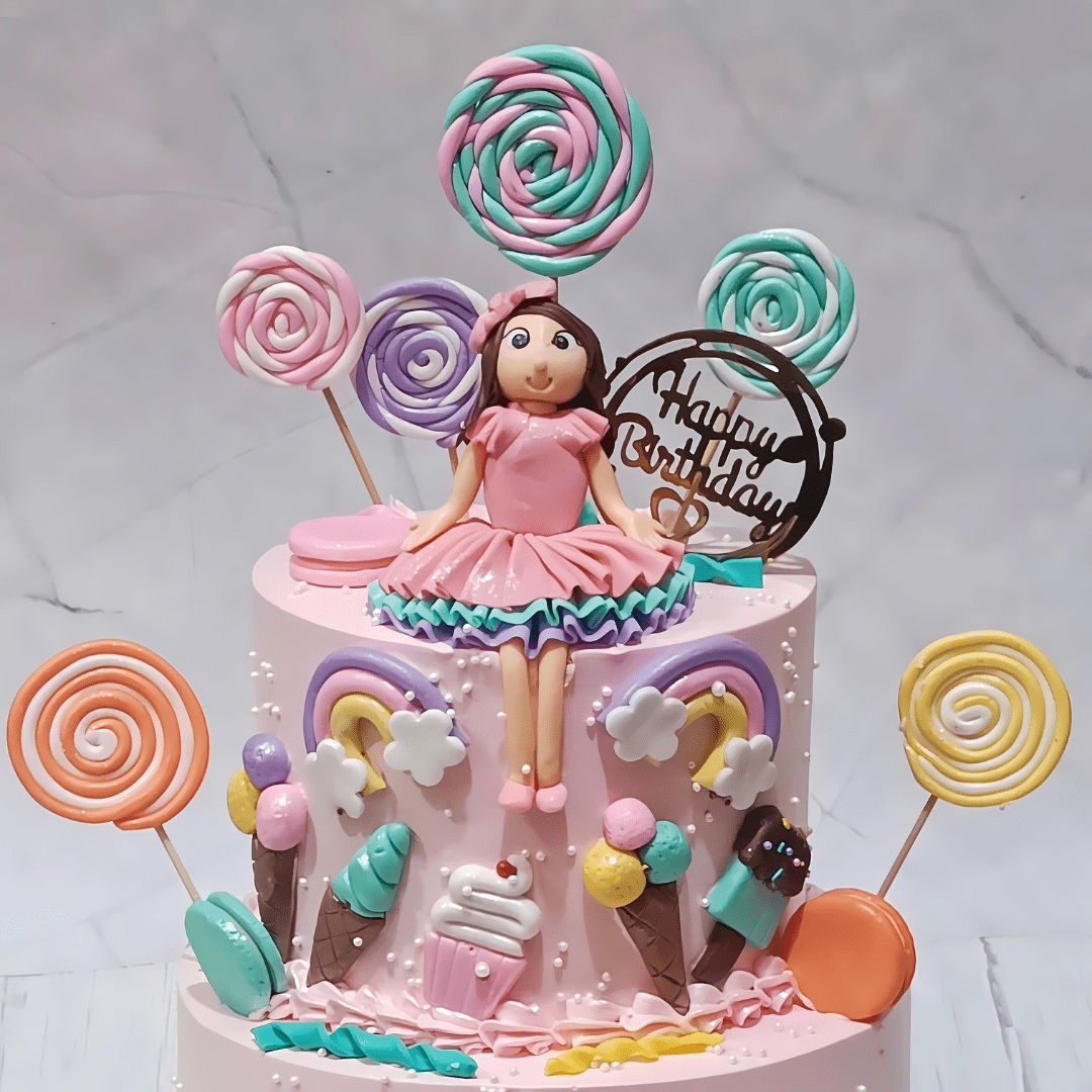 Sweet Swirls & Rainbows 3.5kg choco vanilla 6th birthday Cake by cakestry15,noida,cake top tier close up image