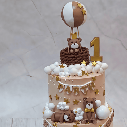 Teddy Express 3kg choco butterscotch first Birthday Cake by cakestry15 noida,cake top tier close up image