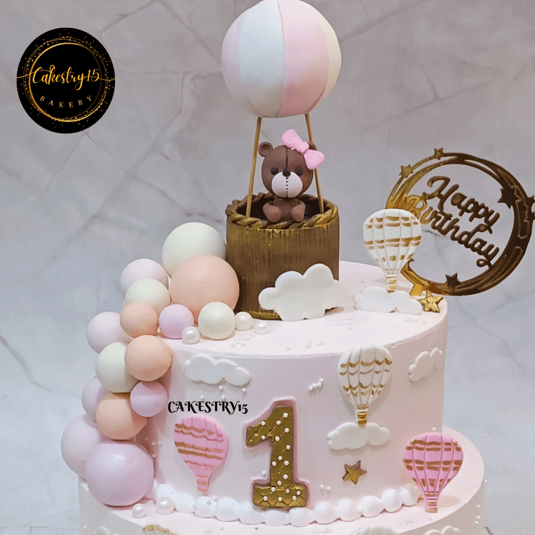 Teddy theme 5kg size 2tier vanilla flavour 1st birthday cake,top tier close up image