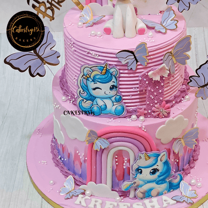 Unicorn theme 3kg size 2tier butterscotch flavor 1st birthday cake,close up image