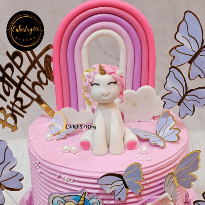 Unicorn theme 3kg size 2tier butterscotch flavor 1st birthday cake,top tier close up image