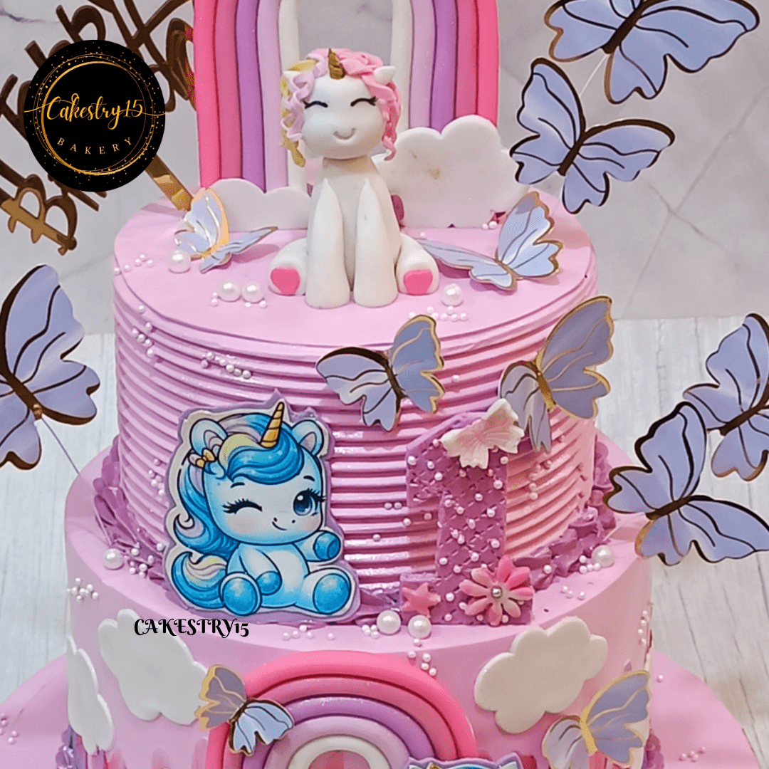 Unicorn theme 3kg size 2tier butterscotch flavor 1st birthday cake,top tier image