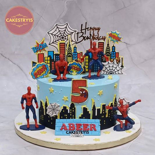 2kg eggless choco chip Spiderman birthday cake with toys and edible buildings from Cakestry15 Noida