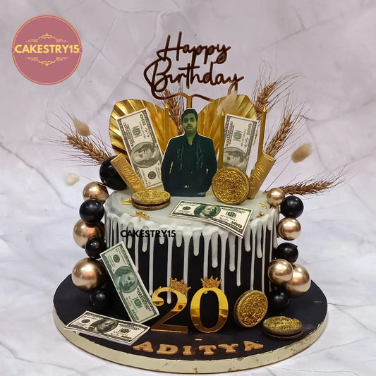 2kg black fondant chocolate cake with edible photo, golden balls, and dollar bills for 20th birthday in Noida by cakestry15