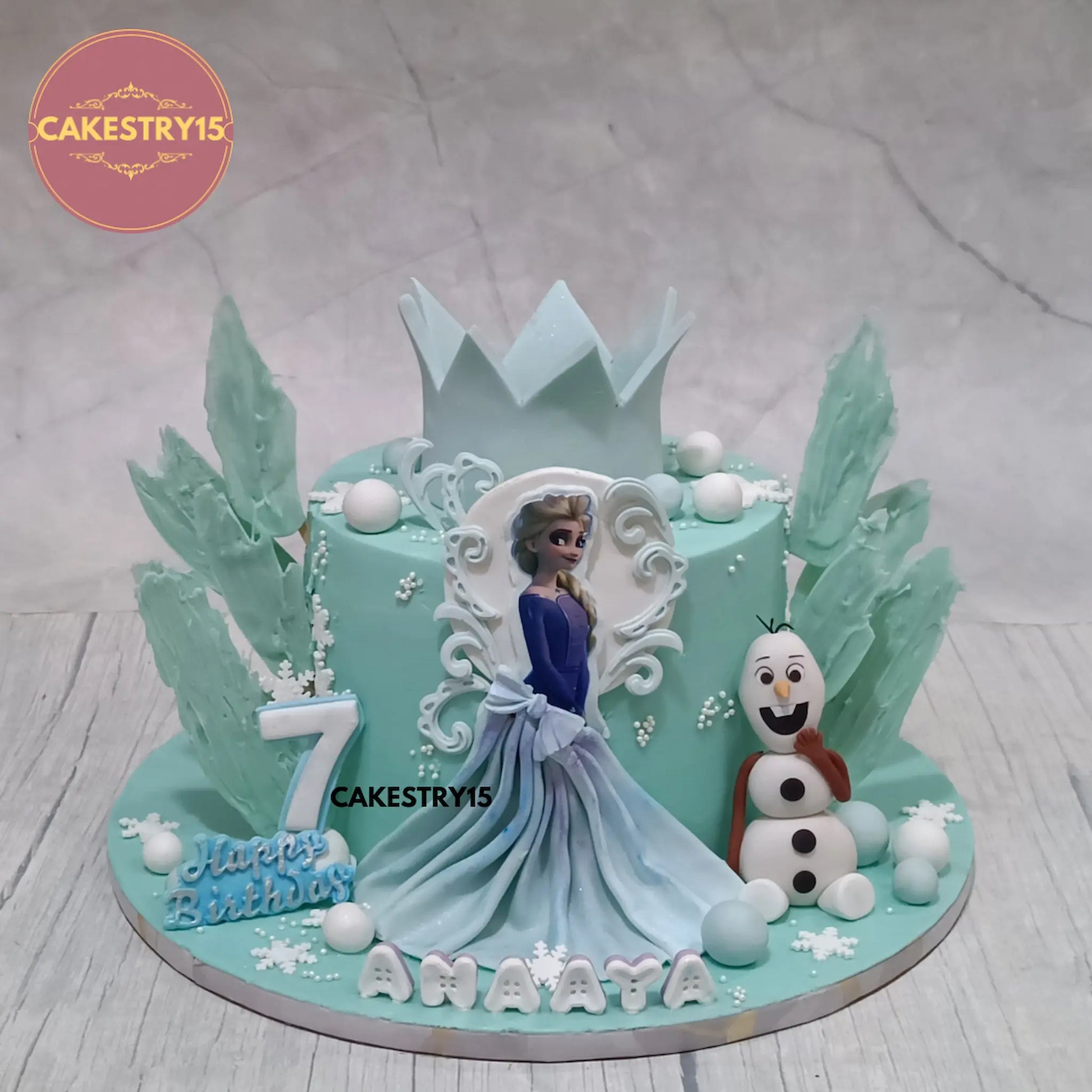 2kg chocolate Frozen theme birthday cake with fondant crown, Olaf, and edible princess image by cakestry15