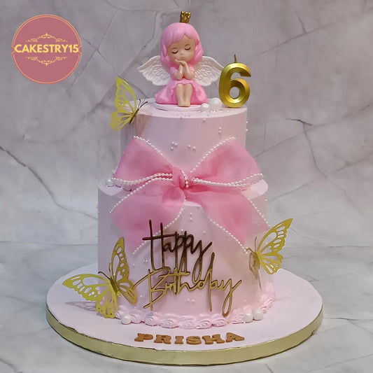 Angel Fairy kids birthday cake with fairy topper and golden butterflies, handcrafted as a theme cake Noida using premium eggless cakes.
