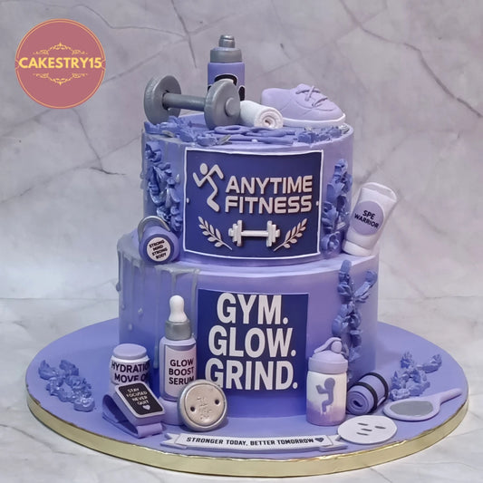 Premium eggless theme cake Noida featuring an Anytime Fitness anniversary design with fitness-inspired decorations and rich chocolate truffle flavour.