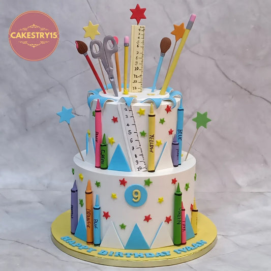 Eggless kids birthday cake with colourful art theme design and fondant stationery elements, perfect theme cake Noida celebration.