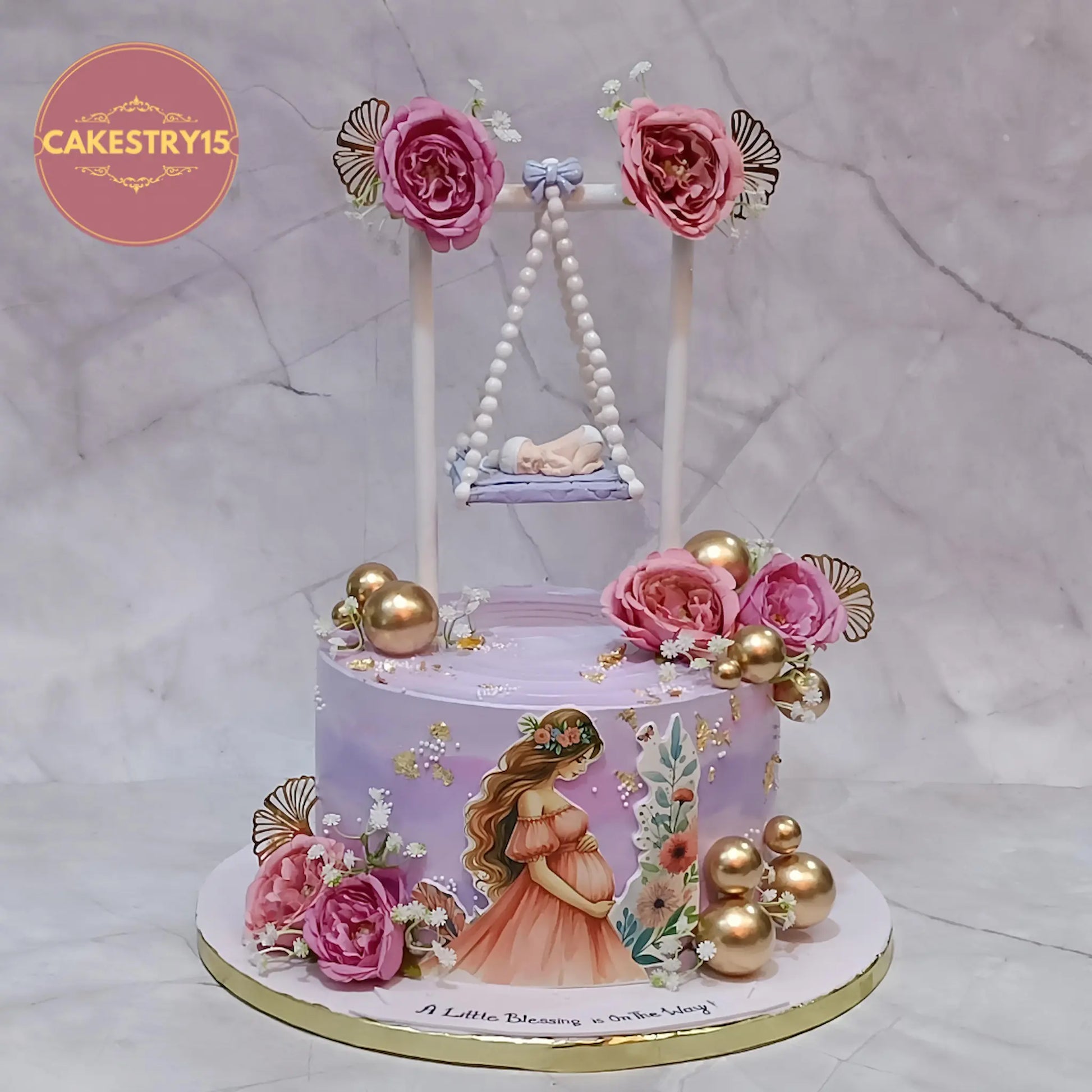 Baby shower theme cake in Noida with eggless chocolate flavour, sleeping baby jhoola and mom-to-be design by cakestry15