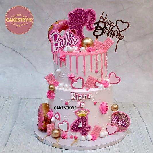 Barbie-themed 2-tier pineapple cake with donuts and name tags for 4th birthday by cakestry15