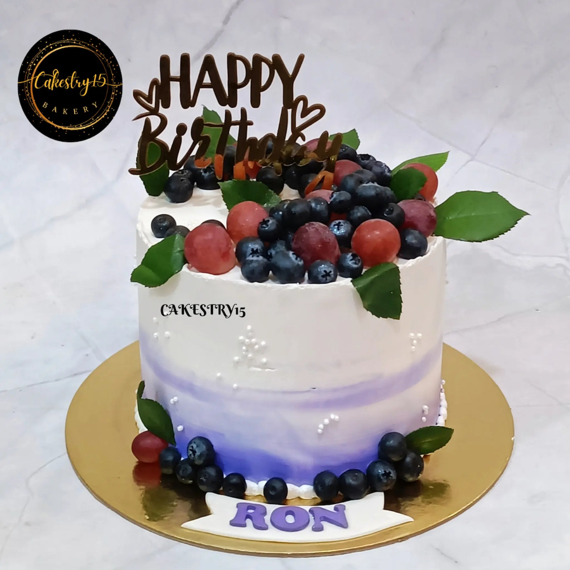 Blueberry Fresh Fruit Birthday Cake featuring fresh fruit toppings, perfect as an eggless kids birthday cake and premium theme cake Noida families love.