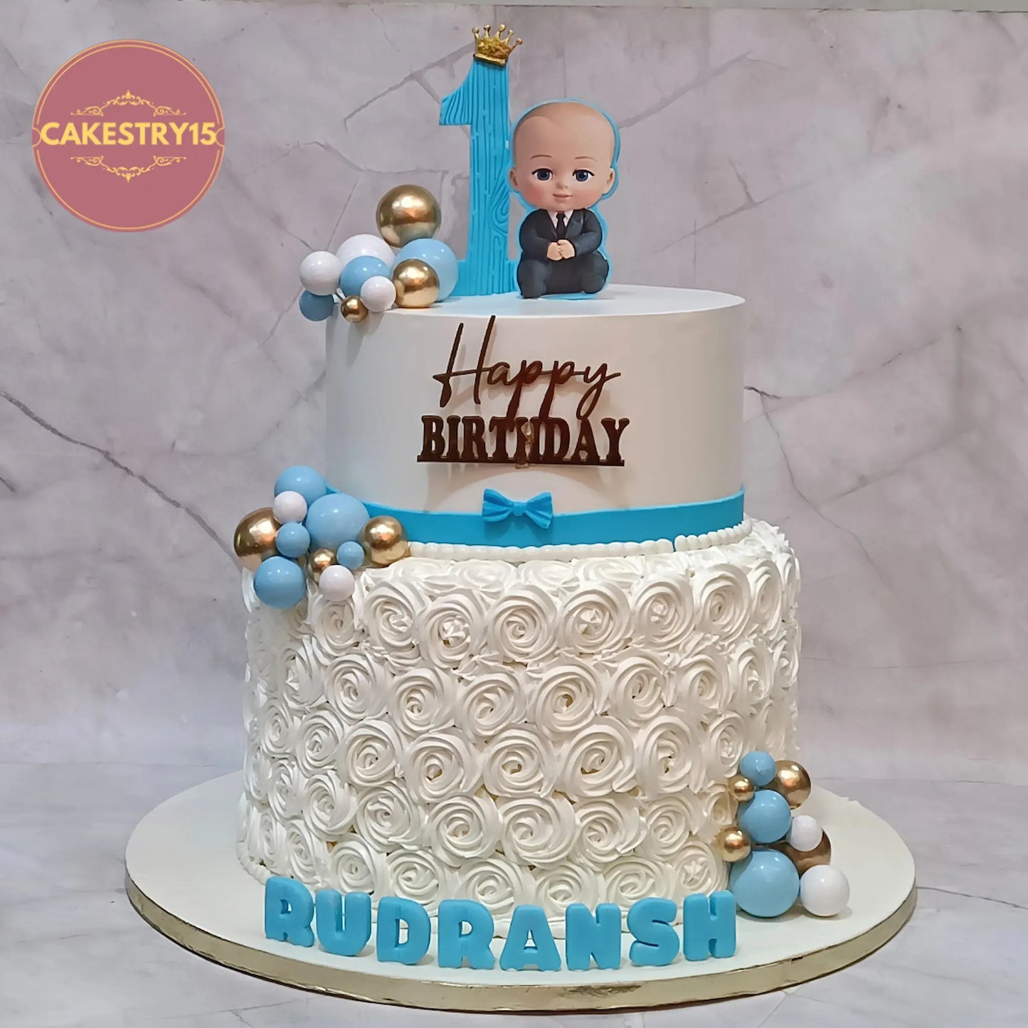 Boss Baby theme first birthday cake 7kg pineapple flavour with edible images, balls and rosettes eggless cake Noida
