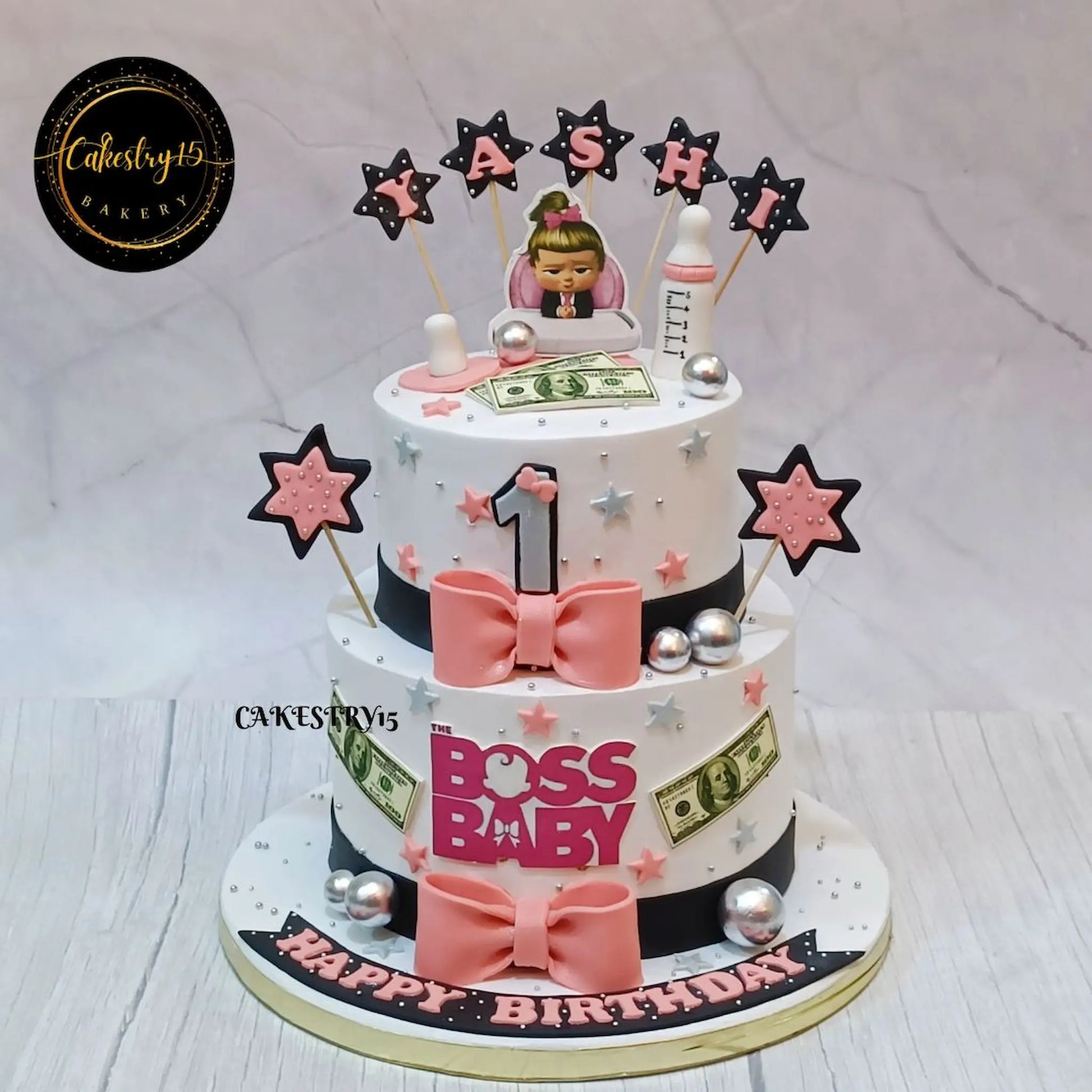 Boss Baby Girl theme first birthday cake for kids in eggless pineapple flavour by Cakestry15 in Noida