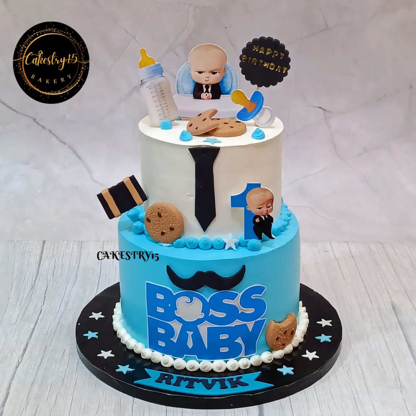 Boss Baby theme eggless first birthday cake for kids with custom design by Cakestry15 Noida