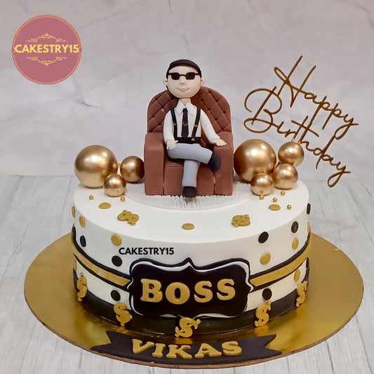 1.5kg chocolate birthday cake with sofa topper, dollar signs, and BOSS tag from Cakestry15

