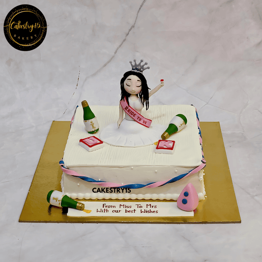 Bride to be pineapple cake with crown, sash, and champagne bottles by cakestry15 noida

