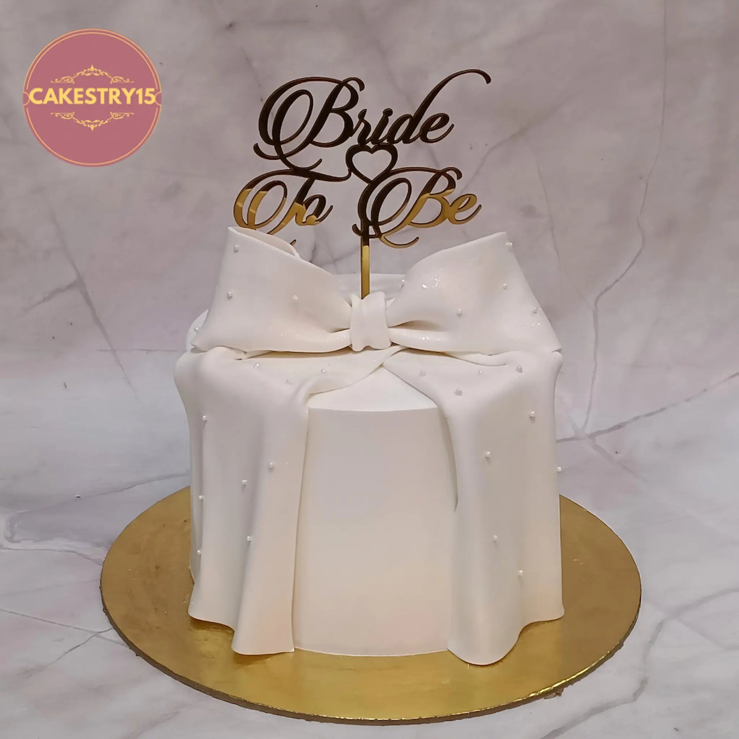 Bride to be theme eggless blueberry cake with fondant bow and topper by Cakestry15 Noida
