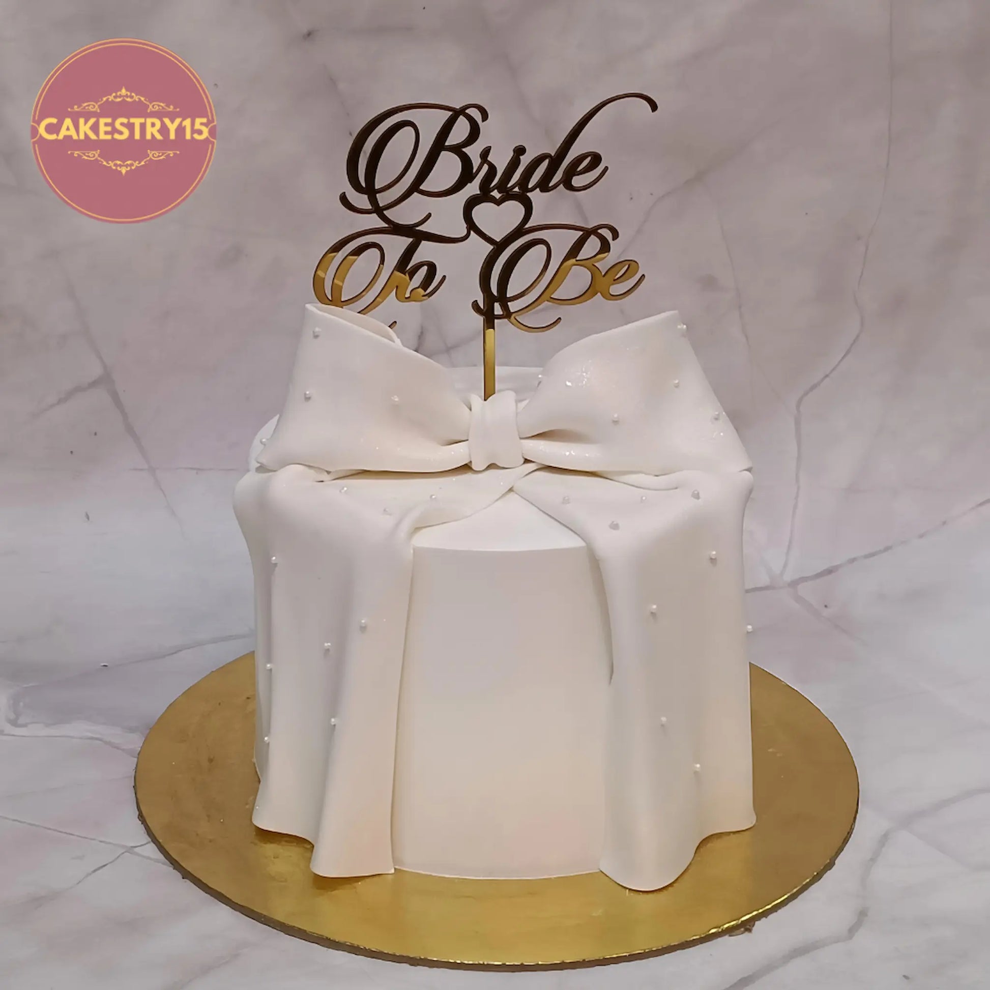 Bride to be theme eggless blueberry cake with fondant bow and topper by Cakestry15 Noida